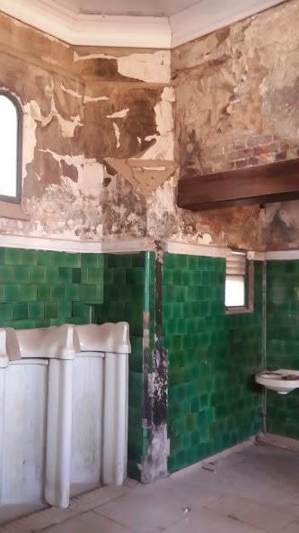 Green tiles in bathroom of old Gentlemans Washrooms in Newtown
