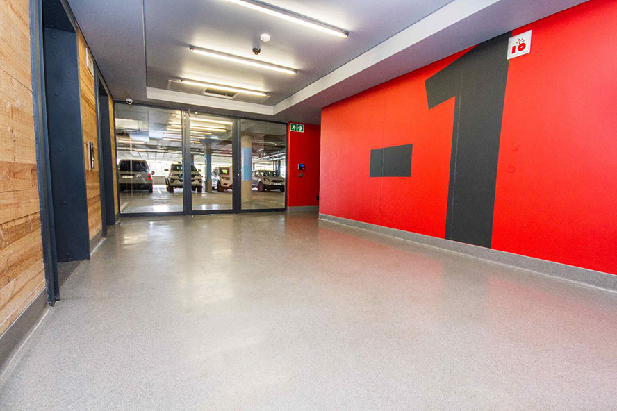 Epoxy resin floor coating Peran STB in a sleek, dappled grey colour was applied in the lobby areas