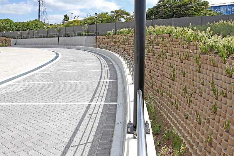 Terraforce hollow-core retaining wall blocks support vegetative growth