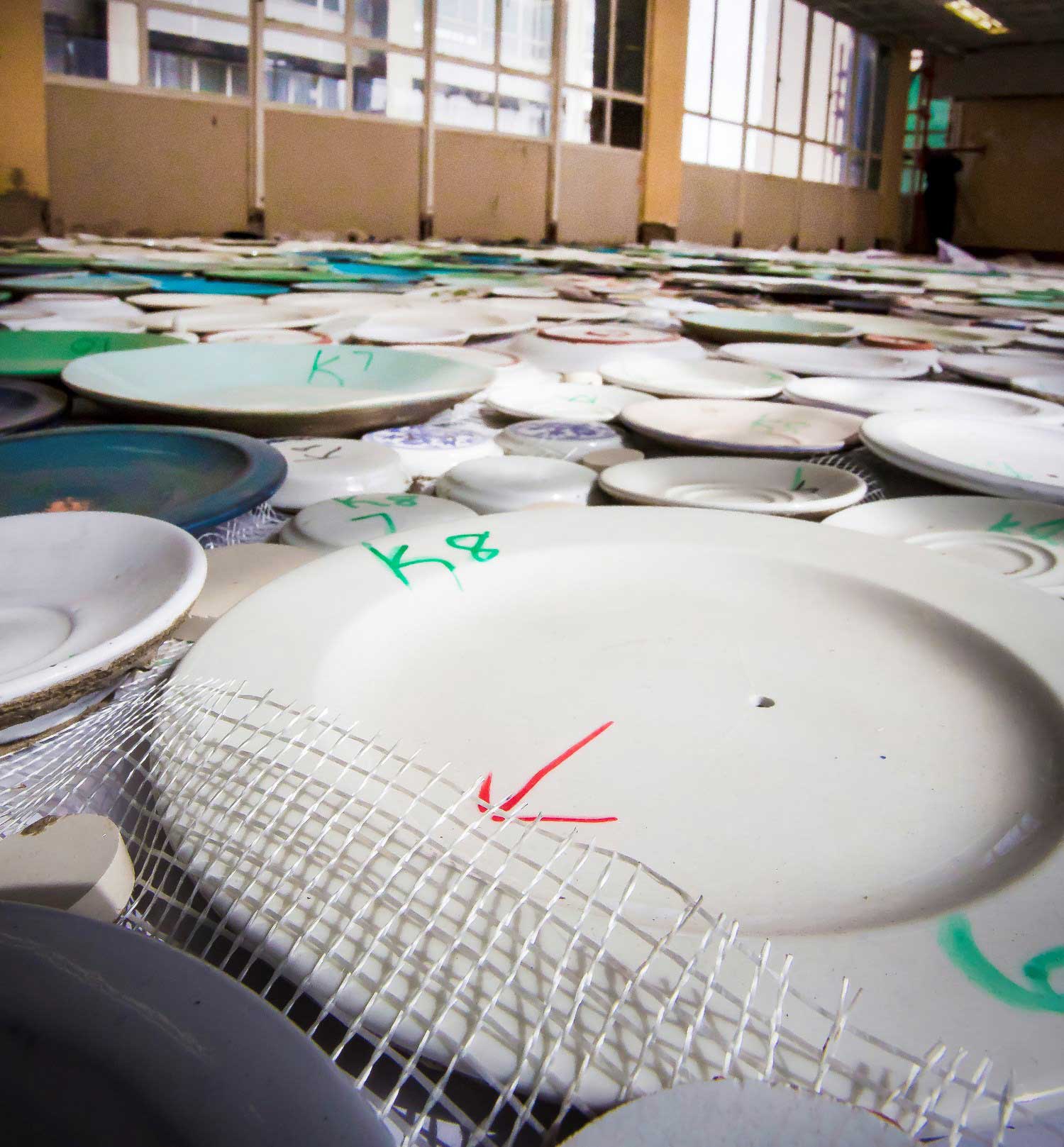 Each piece of crockery represents an individual pixel which needed to be fixed to the building with highly flexible TAL adhesives