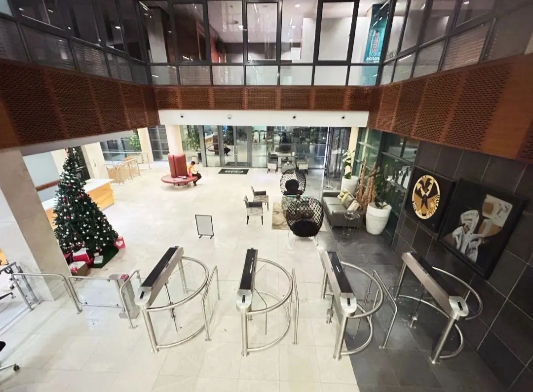 The installation of Triton half-height glass turnstiles and special needs gates at FNB Botswana’s head office.